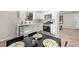 Eat-in kitchen features new appliances and stylish decor at 5401 Martins Crossing Rd, Stone Mountain, GA 30088