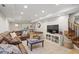 Finished basement area with stylish decor and a comfortable sectional sofa at 960 Lost Forest Dr, Sandy Springs, GA 30328