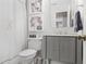 Charming bathroom with gray vanity, stylish mirror, and neutral decor at 960 Lost Forest Dr, Sandy Springs, GA 30328