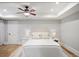 Cozy bedroom featuring neutral colors and recessed lighting for a relaxing ambiance at 960 Lost Forest Dr, Sandy Springs, GA 30328