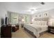 Bright bedroom featuring neutral tones, a cozy armchair, and a comfortable workspace at 960 Lost Forest Dr, Sandy Springs, GA 30328