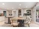 Bright kitchen featuring granite countertops, stainless steel appliances, and a breakfast bar with seating at 960 Lost Forest Dr, Sandy Springs, GA 30328