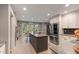 Spacious kitchen with large center island, stainless steel appliances, and stylish accents at 960 Lost Forest Dr, Sandy Springs, GA 30328