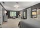 Comfortable main bedroom featuring large windows and serene ambiance at 960 Lost Forest Dr, Sandy Springs, GA 30328