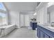 Bathroom boasts double sinks, and granite countertops at 947 Summer Forest Drive, Suwanee, GA 30024