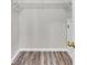 Walk-in closet with wood-look floors and white wire shelving at 947 Summer Forest Drive, Suwanee, GA 30024