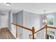 Hallway overlooking the front door and windows at 947 Summer Forest Drive, Suwanee, GA 30024