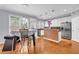 Eat-in kitchen featuring updated cabinets, stainless steel appliances, and granite counters at 947 Summer Forest Drive, Suwanee, GA 30024