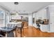 Spacious kitchen with a kitchen island, stainless steel appliances, and adjacent breakfast nook at 947 Summer Forest Drive, Suwanee, GA 30024