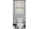 Close-up shot of a standard white toilet in a clean and simple bathroom at 947 Summer Forest Drive, Suwanee, GA 30024