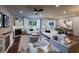 Inviting living room featuring a fireplace, hardwood floors, and comfortable seating at 306 Rockledge Sw Bnd, Powder Springs, GA 30127