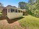 Backyard view of home with back porch at 710 Montclair Sw Dr, Smyrna, GA 30082