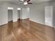 Bedroom features hardwood floors and white trim, with access to bathroom and closets at 710 Montclair Sw Dr, Smyrna, GA 30082
