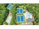 Aerial view of community amenities, including pools, tennis courts, and green spaces at 747 Mill Rock St, Lawrenceville, GA 30044