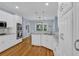 Spacious kitchen with stainless steel appliances, granite countertops, and ample cabinet space at 747 Mill Rock St, Lawrenceville, GA 30044