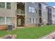 Exterior view of backyard, lawn and outdoor space of the building at 1300 Hopkins Dr, Decatur, GA 30033