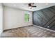 Bedroom featuring carpeted floors, one window, and a wall with geometric wood trim design at 232 Apple Branch Dr, Woodstock, GA 30188