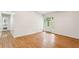 Spacious bedroom with light walls, wood-look floors and access to backyard at 232 Apple Branch Dr, Woodstock, GA 30188