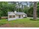 Charming renovated cottage with beautiful lawn, trees and updated features at 232 Apple Branch Dr, Woodstock, GA 30188