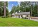 Charming renovated cottage with beautiful lawn, trees and updated features at 232 Apple Branch Dr, Woodstock, GA 30188