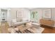 Bright living room features recessed lighting, decor, and door to yard at 232 Apple Branch Dr, Woodstock, GA 30188