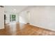 This open living space features recessed lighting, dining area and wood floor at 232 Apple Branch Dr, Woodstock, GA 30188