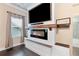 Modern fireplace with shiplap surround, perfect for cozy evenings by the fire at 411 Ridgeway Ln, Canton, GA 30114