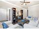 Inviting living room with hardwood floors, built-in shelving, and a cozy fireplace at 411 Ridgeway Ln, Canton, GA 30114