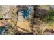A bird's eye view shows the roof, driveway, and backyard at 204 Elm St, Palmetto, GA 30268