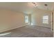Bedroom with neutral carpet, natural light and high ceilings at 204 Elm St, Palmetto, GA 30268