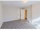 Carpeted bedroom with a closet and fresh paint at 204 Elm St, Palmetto, GA 30268