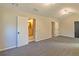 Bedroom with neutral carpet and en suite bathroom at 204 Elm St, Palmetto, GA 30268