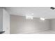 Finished basement with carpet and bright lighting at 6275 Cheatham Lake Nw Dr, Acworth, GA 30101