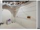 Unfinished basement with exposed ducts, shelving, and utility connections at 6275 Cheatham Lake Nw Dr, Acworth, GA 30101