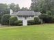 Charming single-story home with a welcoming front porch and well-manicured lawn at 6275 Cheatham Lake Nw Dr, Acworth, GA 30101