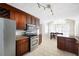 Bright kitchen features stainless steel appliances and adjacent dining area at 6275 Cheatham Lake Nw Dr, Acworth, GA 30101