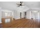 Spacious living room featuring high ceilings, hardwood floors, and decorative lighting at 6275 Cheatham Lake Nw Dr, Acworth, GA 30101