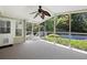 Enclosed sunroom with view of pool and backyard greenery at 6275 Cheatham Lake Nw Dr, Acworth, GA 30101