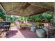 Inviting covered back porch with comfortable seating and natural light provides the perfect space for relaxation at 4205 Jeri Lynn Ct, Tucker, GA 30084