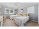 Comfortable bedroom with carpet flooring, ceiling fan, and two twin beds offers a versatile space at 4205 Jeri Lynn Ct, Tucker, GA 30084