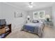 Cozy bedroom with carpet flooring, a ceiling fan, and lots of natural light offers a comfortable space at 4205 Jeri Lynn Ct, Tucker, GA 30084