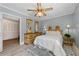 Bedroom with neutral walls, decorative mirrors, and natural light at 4205 Jeri Lynn Ct, Tucker, GA 30084