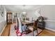 Formal dining room with elegant decor, hardwood floors, and a chandelier for memorable gatherings at 4205 Jeri Lynn Ct, Tucker, GA 30084
