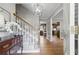 Inviting entryway with hardwood floors, a staircase, and elegant decor, creating a warm ambiance at 4205 Jeri Lynn Ct, Tucker, GA 30084