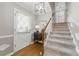 Charming foyer with hardwood floors, a staircase and a decorative front door welcomes you into the home at 4205 Jeri Lynn Ct, Tucker, GA 30084
