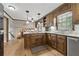 Well-maintained kitchen with wood cabinets, stone countertops, and hardwood floors is ready for any meal at 4205 Jeri Lynn Ct, Tucker, GA 30084
