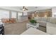 Spacious living area with a dining table, comfortable sofa, and abundant natural light at 4205 Jeri Lynn Ct, Tucker, GA 30084