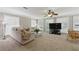 Bright living room featuring multiple windows, neutral walls, and a comfortable sofa at 4205 Jeri Lynn Ct, Tucker, GA 30084