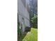 Exterior view of the house showing utility connections, the air conditioning unit, and side yard space at 4287 Ridgetop Trl, Ellenwood, GA 30294