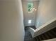 Two-story foyer with chandelier and view of front door at 142 Tye St, Stockbridge, GA 30281
